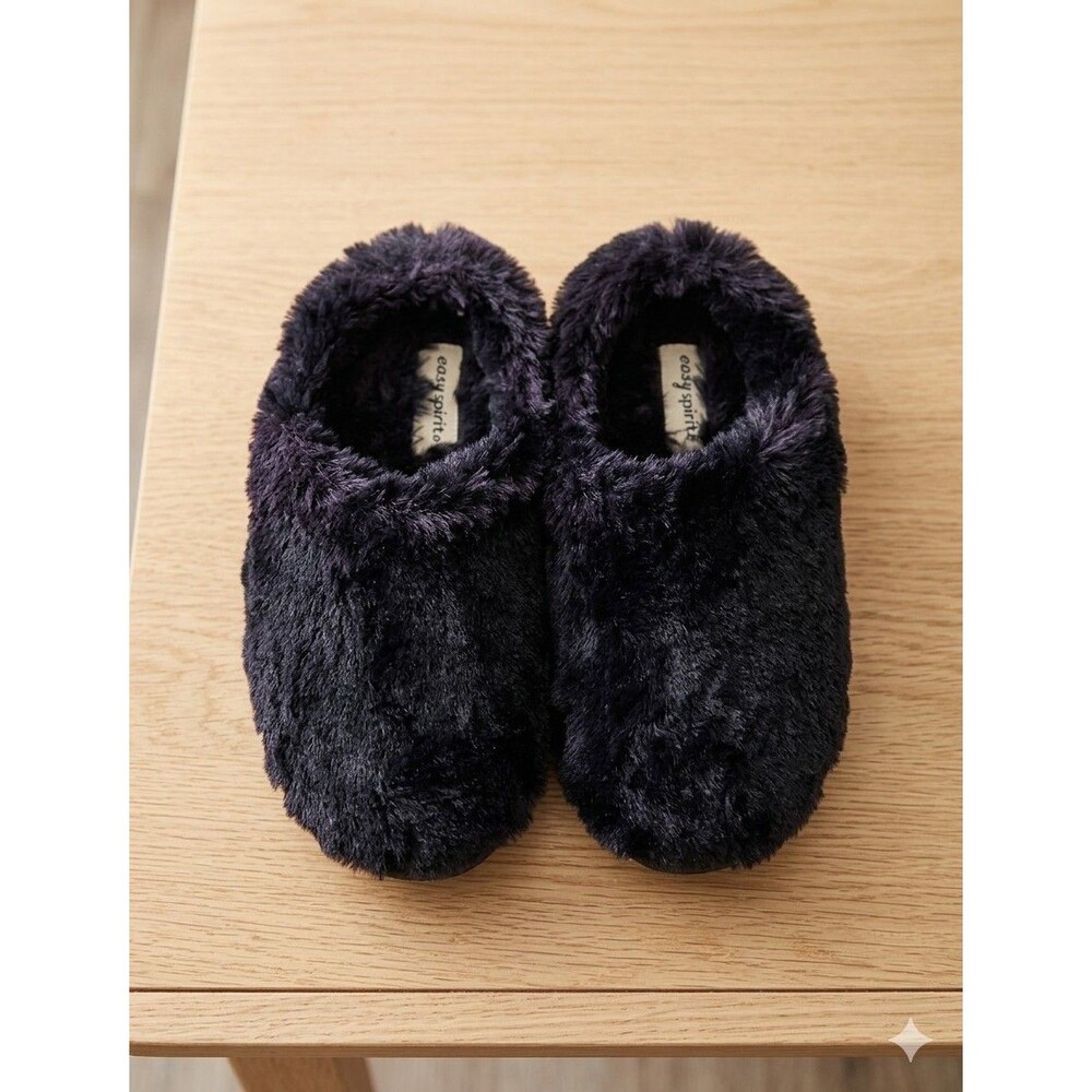 Easy Spirit fuzzy slippers feature a slip-on design and a textured plush uppeNEW